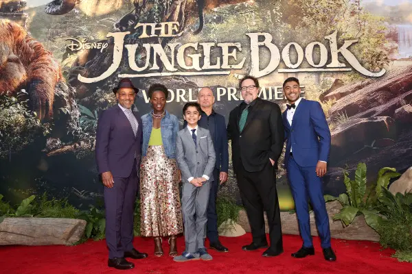 HOLLYWOOD, CALIFORNIA - APRIL 04: (L-R) Actors Giancarlo Esposito, Lupita Nyong'o, Neel Sethi, Ben Kingsley, director/producer Jon Favreau and actor Ritesh Rajan attend The World Premiere of Disney's "THE JUNGLE BOOK" at the El Capitan Theatre on April 4, 2016 in Hollywood, California. (Photo by Jesse Grant/Getty Images for Disney) *** Local Caption *** Neel Sethi; Lupita Nyong'o; Ritesh Rajan; Ben Kingsley; Ritesh Rajan; Jon Favreau