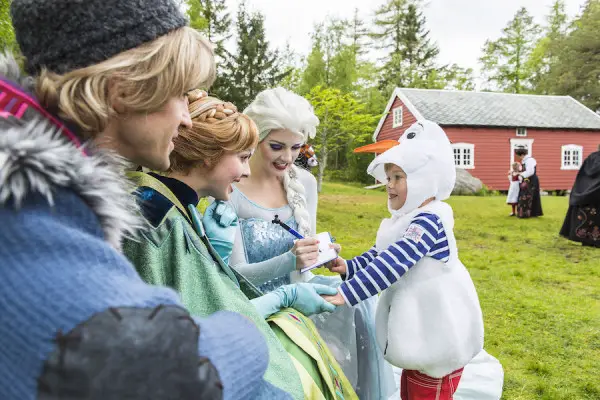 In a Port Adventure like only Disney can do, Anna and Elsa join a traditional Norwegian summer celebration for their first appearance in the land that inspired their story. As part of the Disney Cruise Line Northern European summer season, the Disney Magic sails to Ålesund, Norway. (Matt Stroshane, photographer)