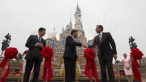 SHANGHAI (June 16, 2016) – Thousands of invited guests celebrated the Grand Opening of Shanghai Disney Resort today with the help of a flood of Shanghai Disney cast members and Disney character friends. Bob Iger, chairman and CEO of The Walt Disney Company (right) joined Chinese CPC Politburo members Wang Yang, State Council Vice Premier (middle), and Han Zheng, Party Secretary of Shanghai (left), to officially open the resort’s new theme park, Shanghai Disneyland, at the iconic Enchanted Storybook Castle. At the dedication ceremony,six performers wearing enormous, colorful flags represented the six lands of Shanghai Disneyland: Adventure Isle, Gardens of Imagination, Fantasyland, Mickey Avenue, Tomorrowland and Treasure Cove. Shanghai Disney Resort is a world-class family entertainment destination, imagined and created especially for the people of China. The resort consists of Shanghai Disneyland, a theme park with magical experiences for guests of all ages; two richly themed hotels; Disneytown, an international shopping, dining and entertainment district; and Wishing Star Park, a recreational area with peaceful gardens and a glittering lake. Shanghai Disney Resort is a joint venture between The Walt Disney Company and Shanghai Shendi Group comprised of two owner companies (Shanghai International Theme Park Company Limited and Shanghai International Theme Park Associated Facilities Company Limited) and a management company (Shanghai International Theme Park and Resort Management Company Limited). (Matt Stroshane, photographer)