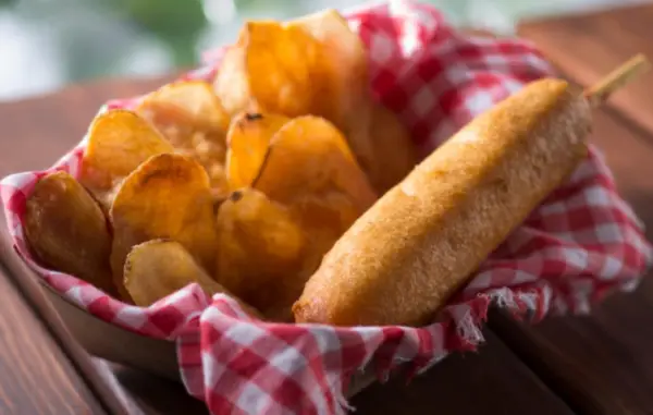 Find Out Where You Can Grab a Delicious Hand-Dipped Corn Dog While Enjoying Magic Kingdom!